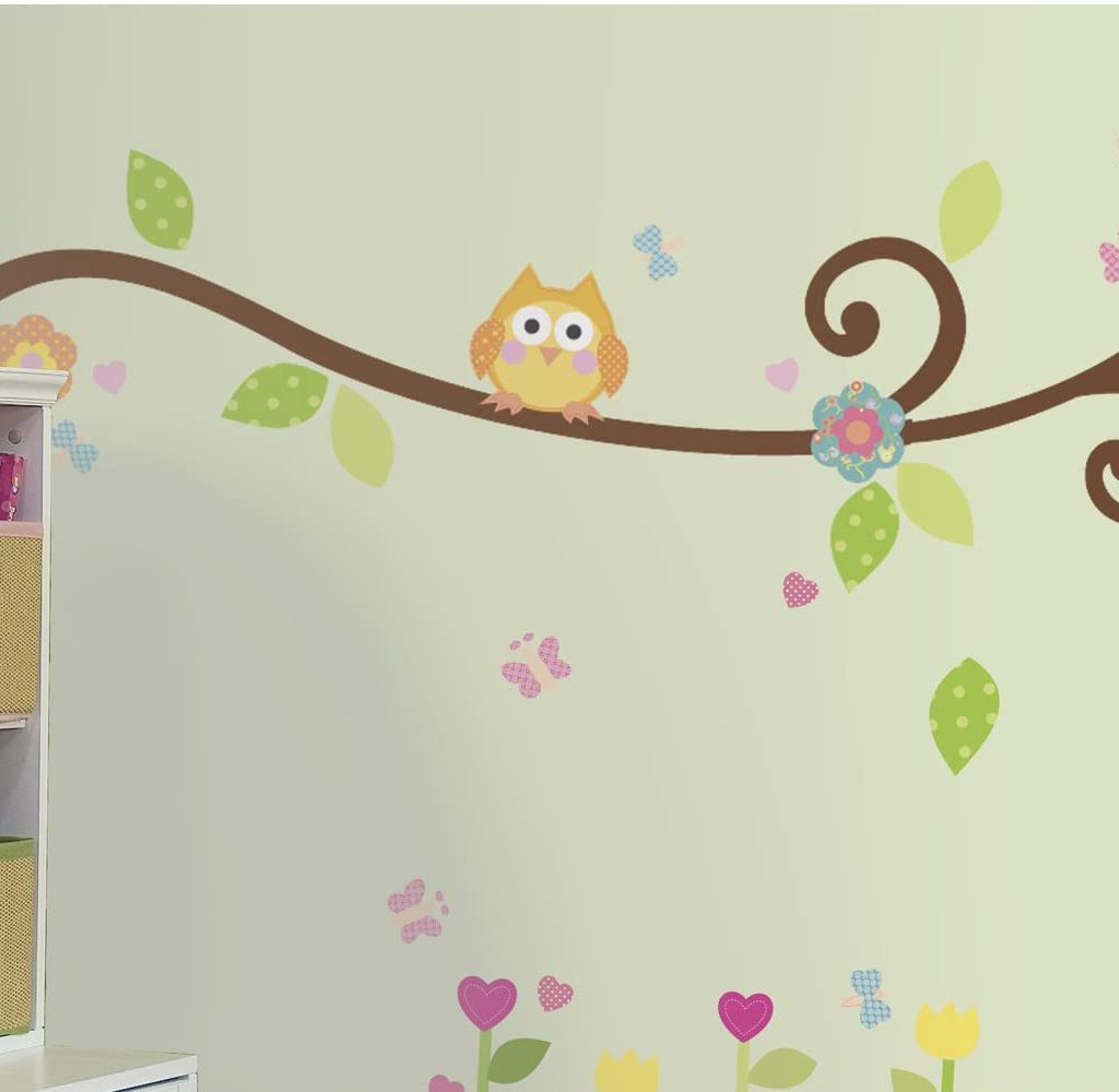 wall decal with an own on a branch