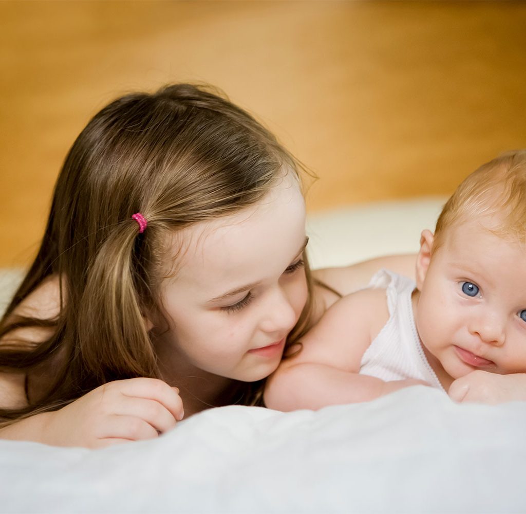 big sister and baby