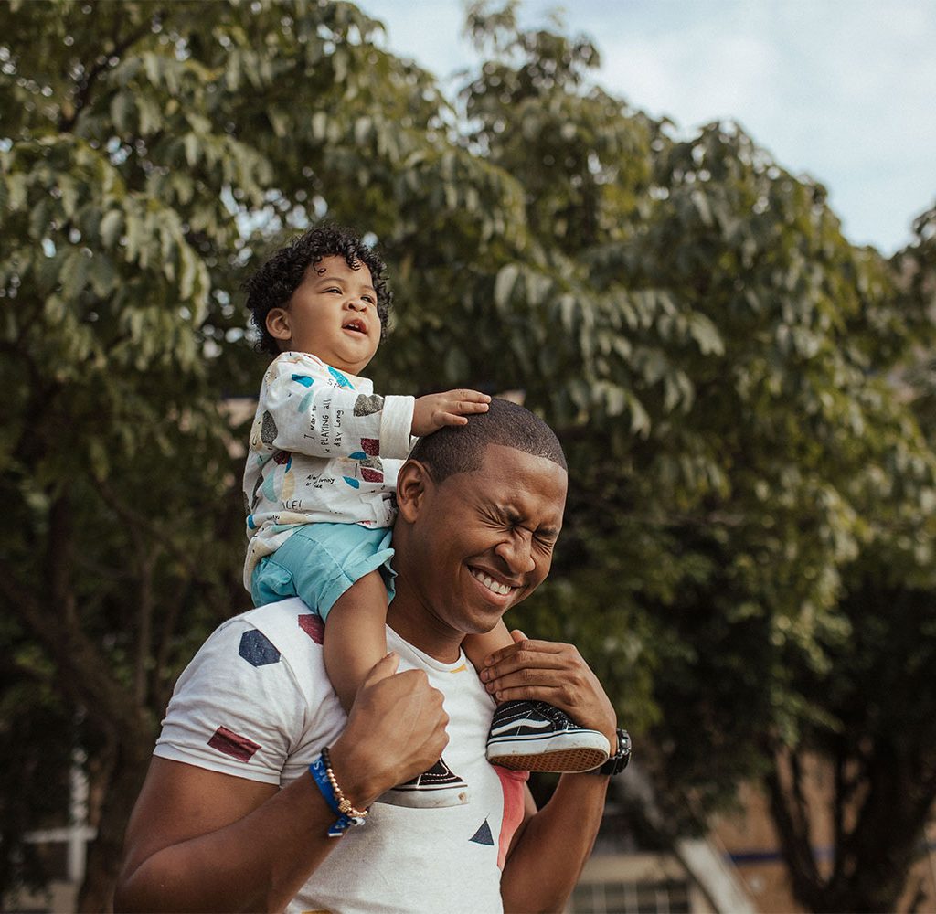 father and toddler in nature