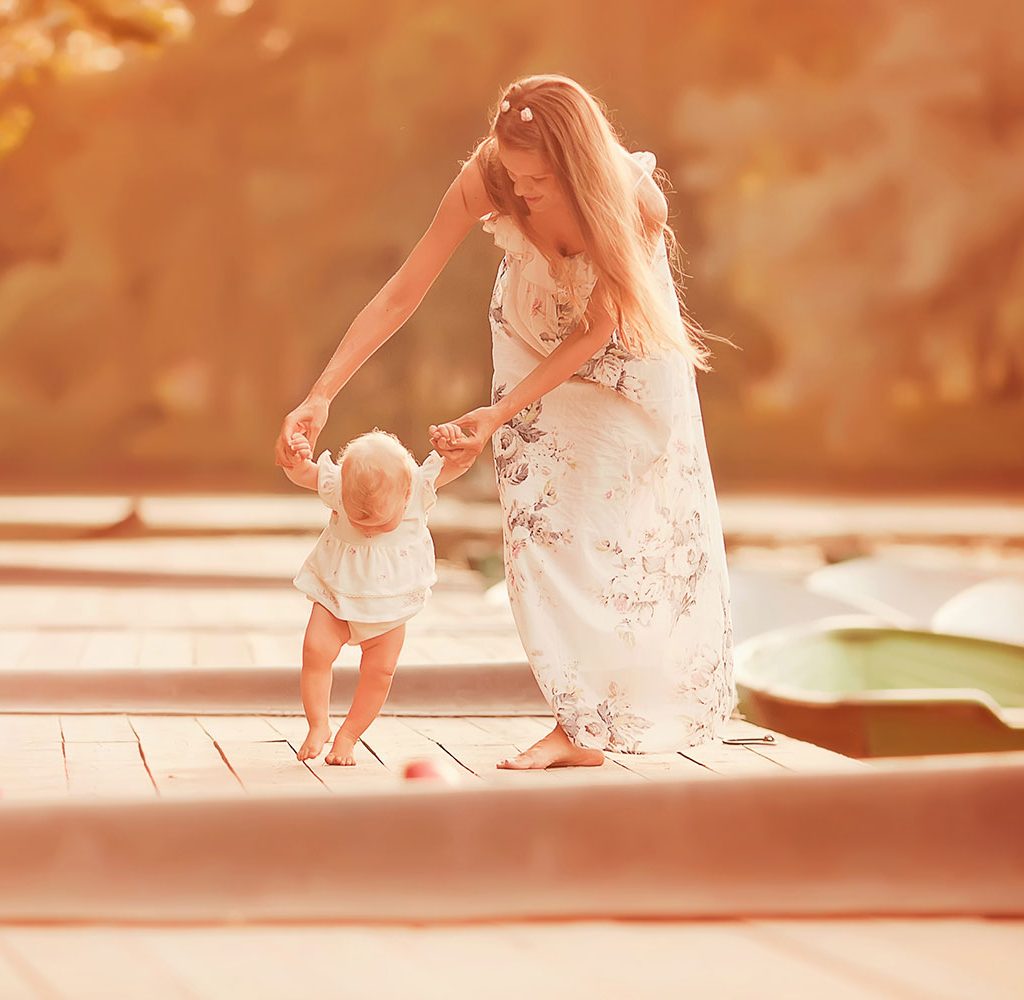 mother and baby walking milestone