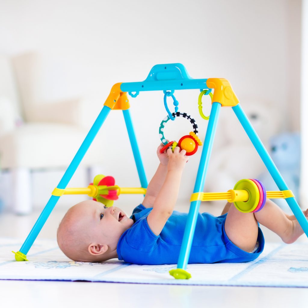 Baby playing on a play mat