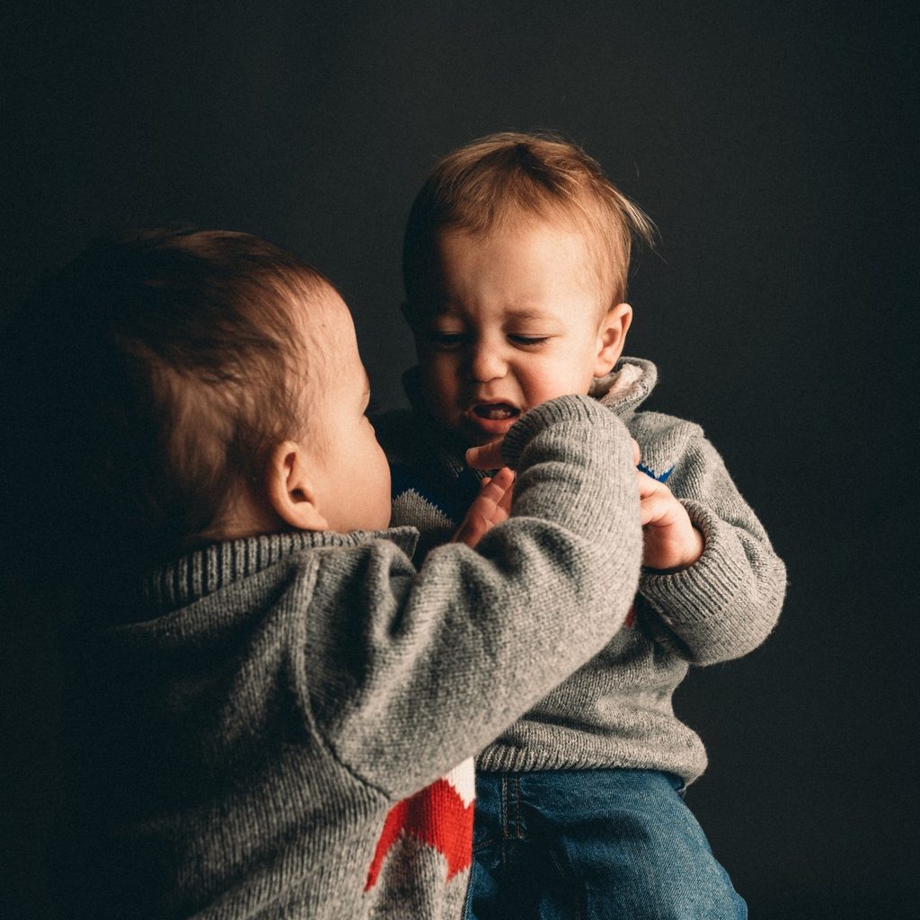 Two toddlers arguing