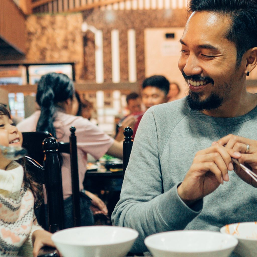 Father and son at a restaurant