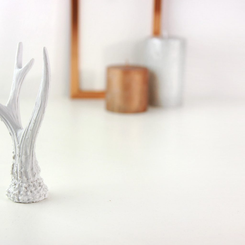 white antler decor on dresser