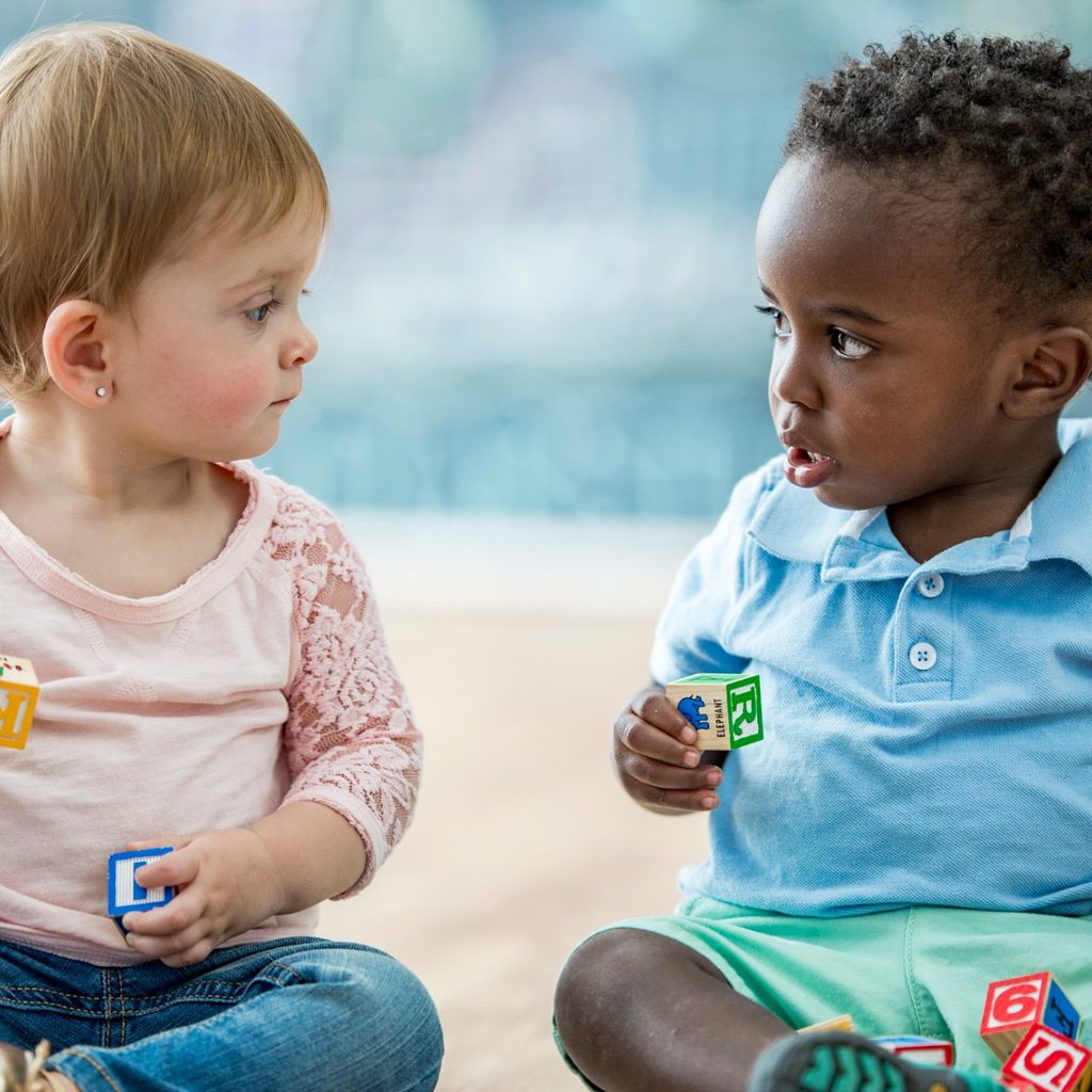 Girl and boy toddlers on a play date