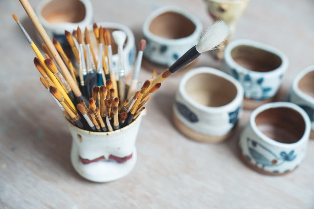 Paintbrushes and cups
