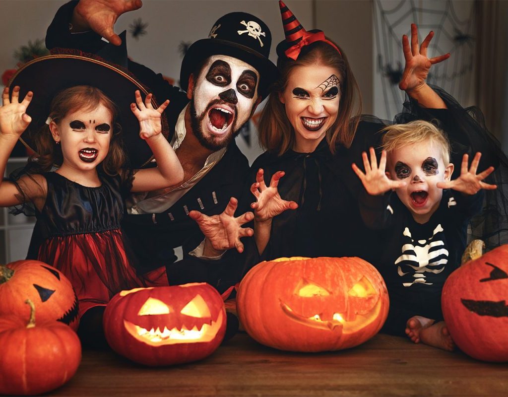 A family dressed up for Halloween.