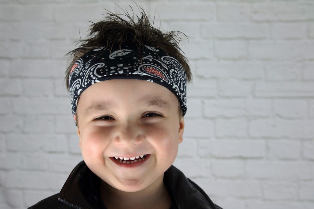 Boy dressed as a rock star for Halloween