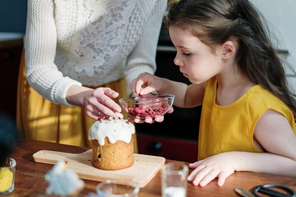 child learning to cook