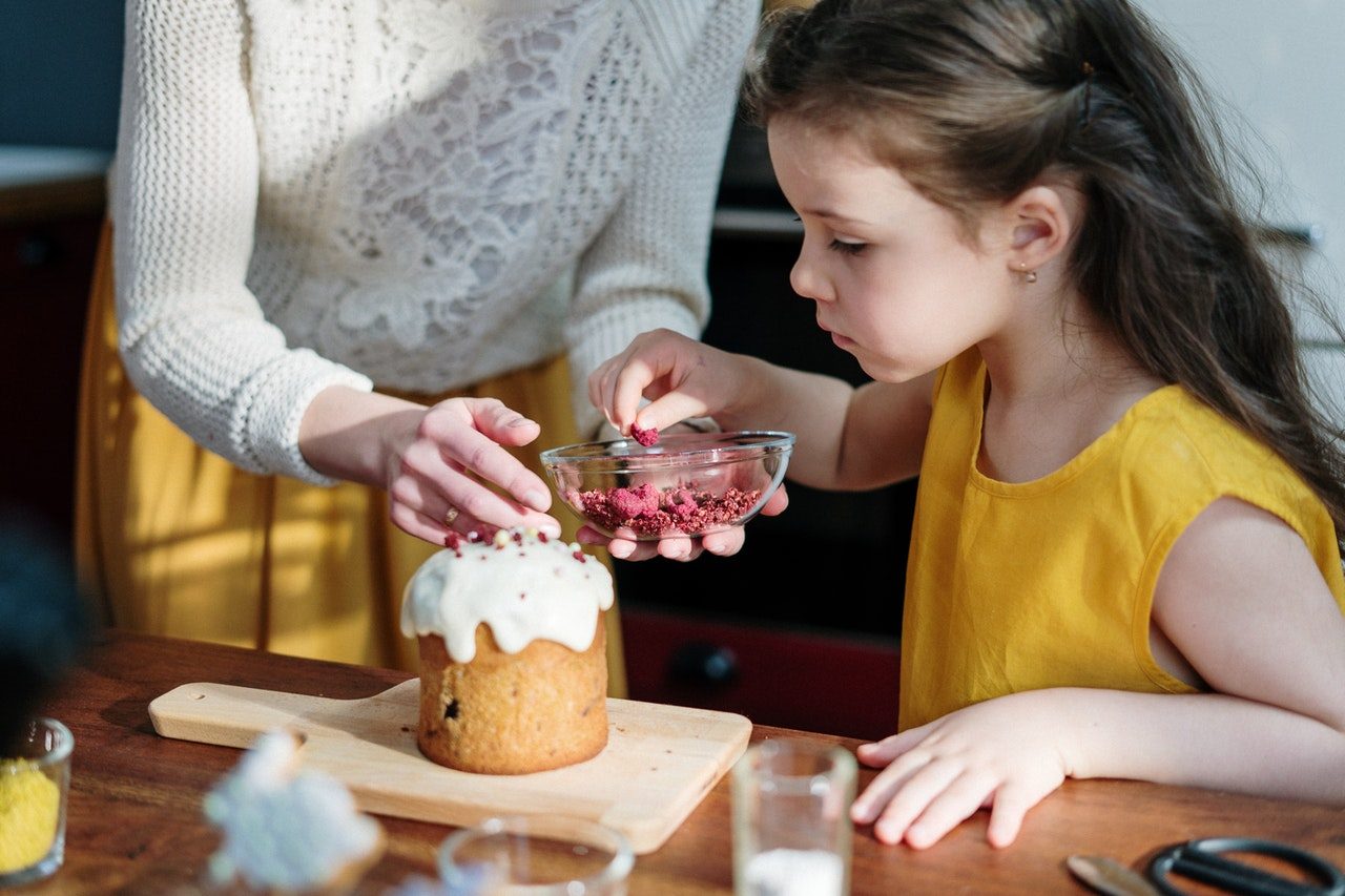 child learning to cook