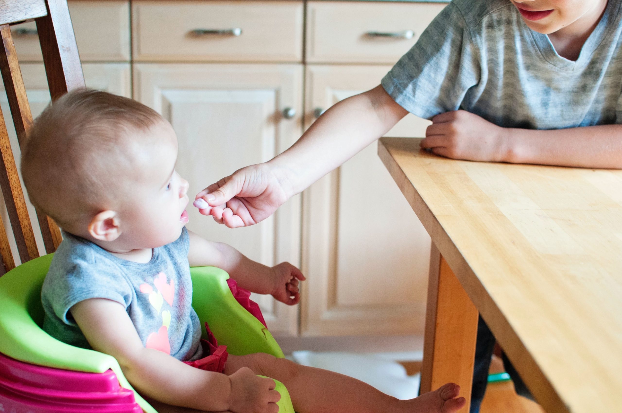 toddler eating seafood