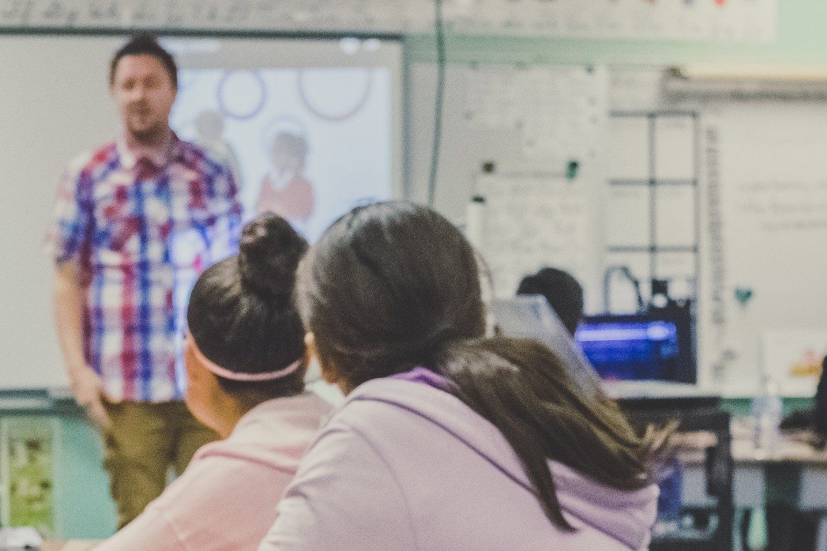 Teacher addressing students in a classroom