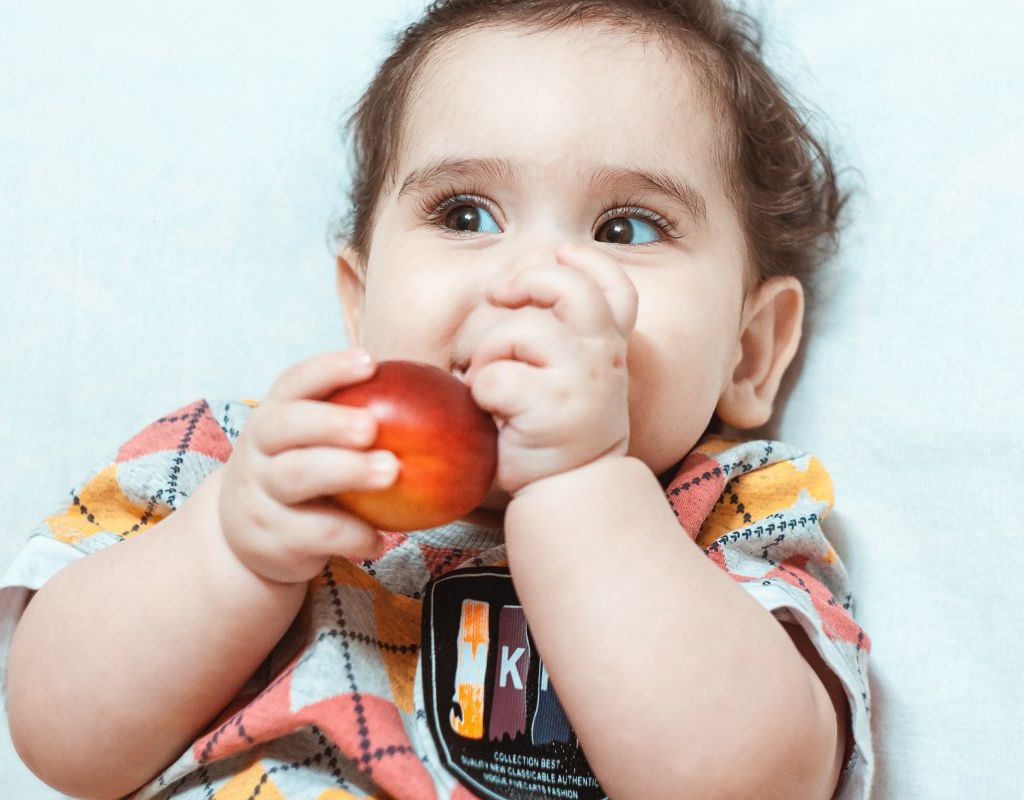 Baby With An Apple