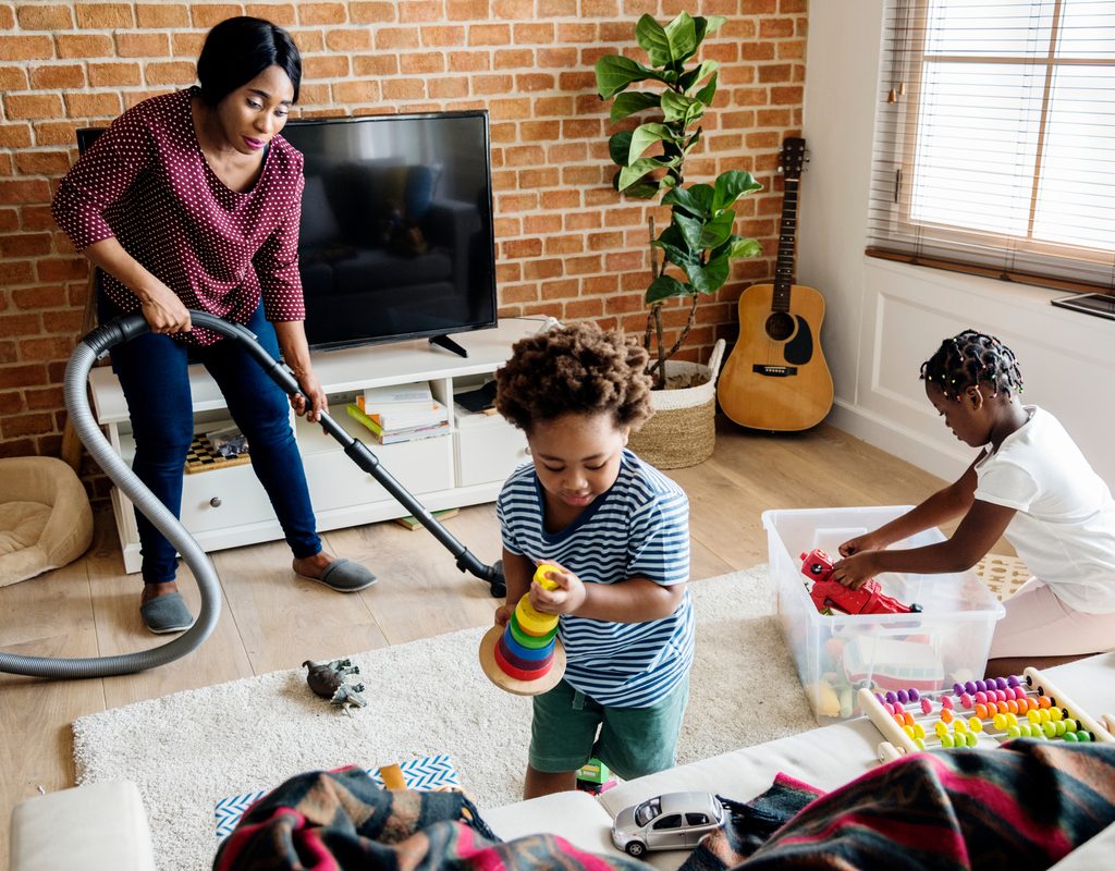 A family doing chores together at home