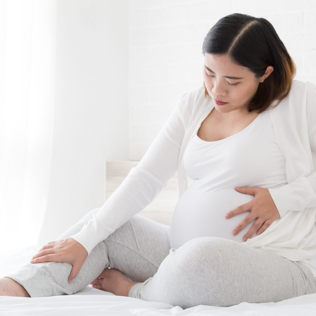 Pregnant woman with sore feet
