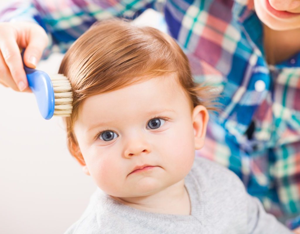 Brushing a toddler's hair