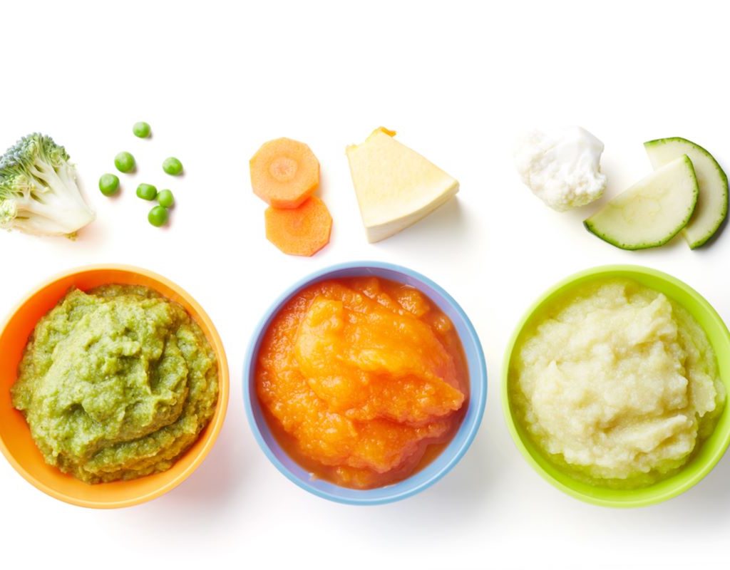 Three bowls of pureed baby foods
