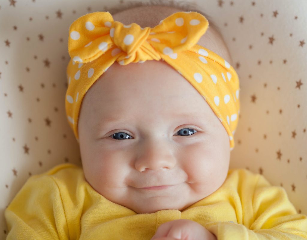 baby in polka dot headband