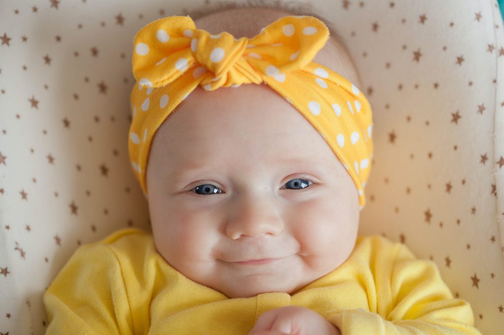 Baby in polka dot headband