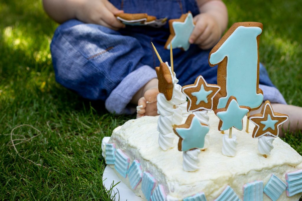Little boy with his blue smash cake