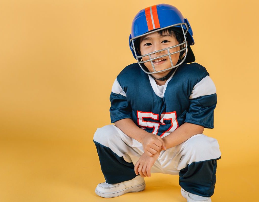 Child In football gear