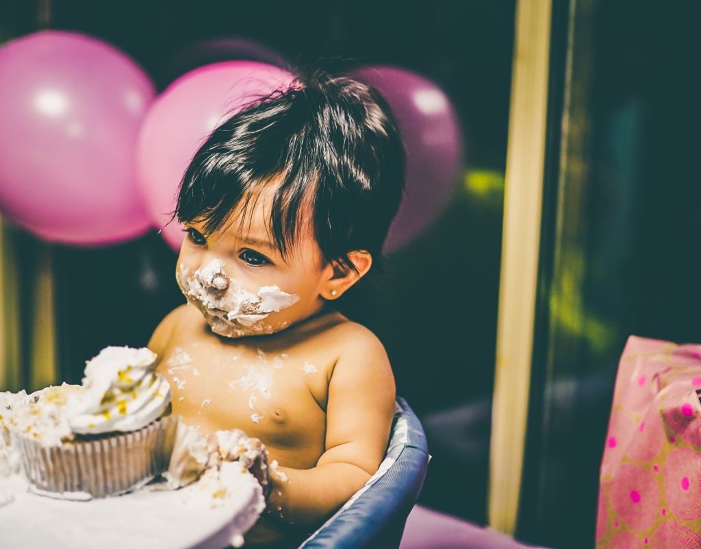 A Baby With Smashed Cake