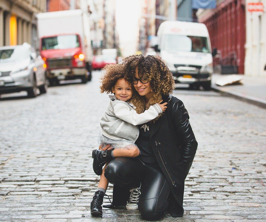 Mom and child in street
