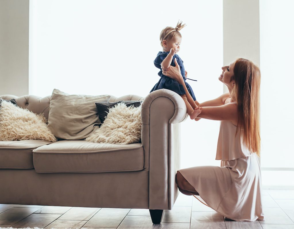 Mom with baby on couch