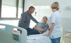 Pregnant woman in labor at hospital.