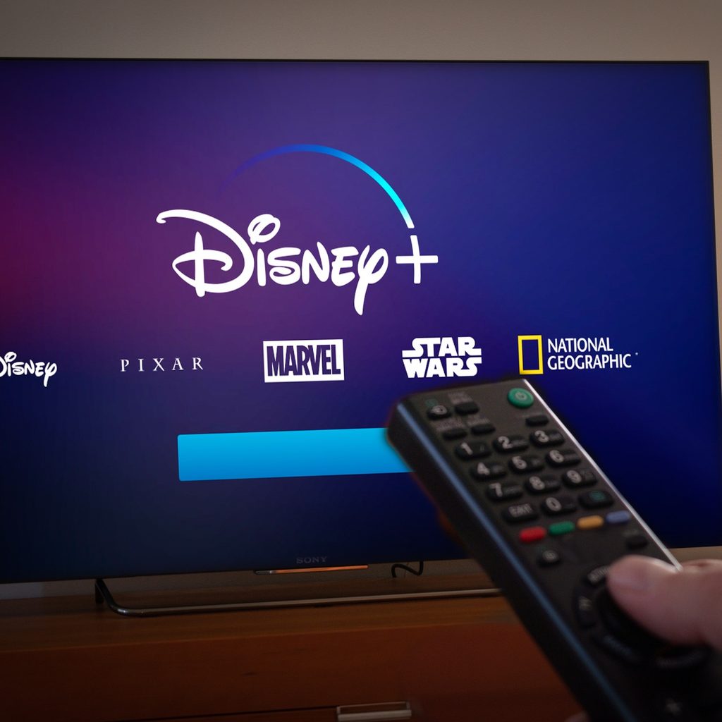 Disney+ being watched on TV with remote