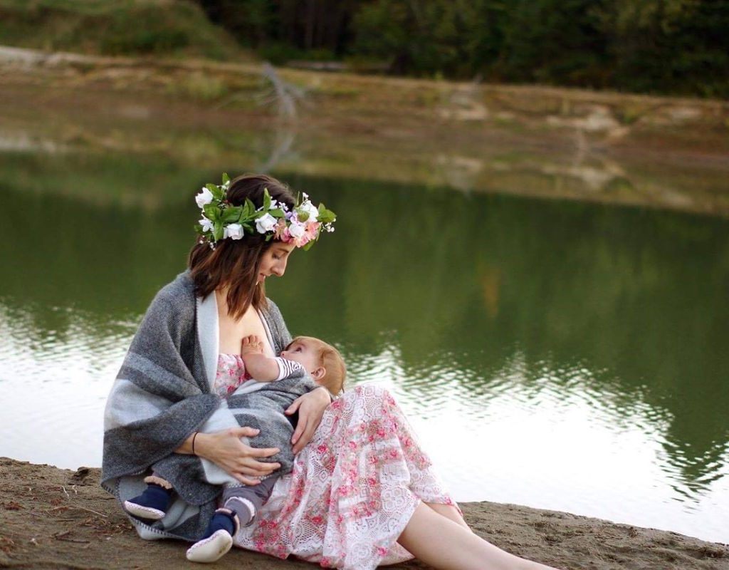 A mother breastfeeding her baby