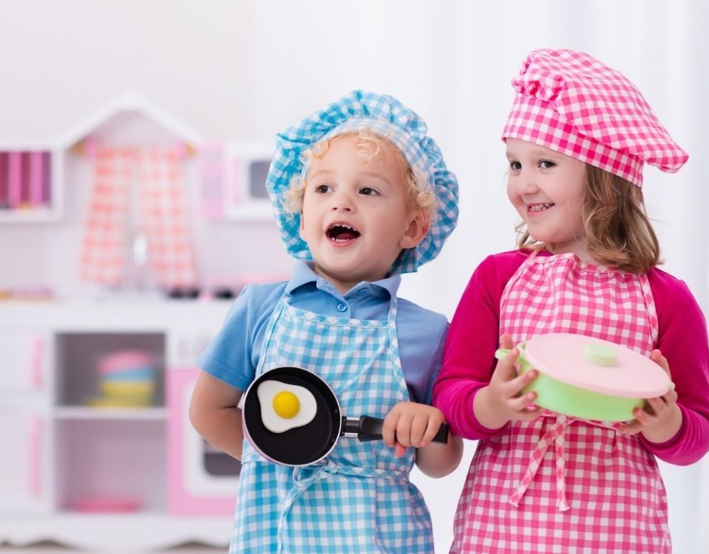 Two toddlers in the kitchen