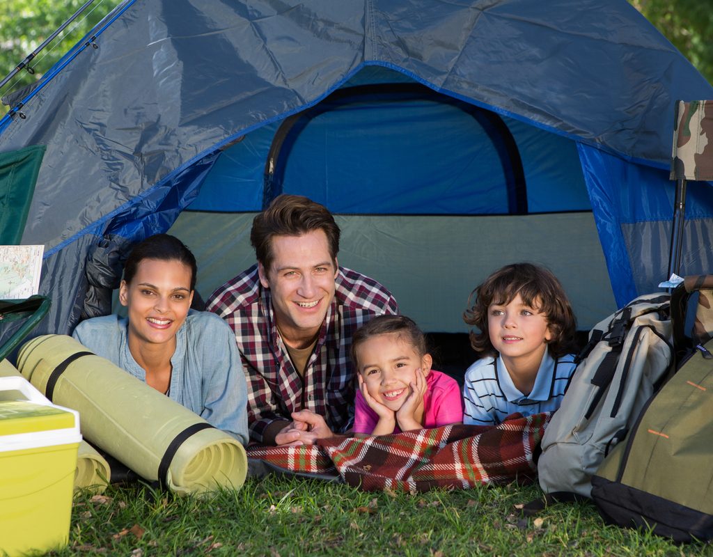Family in a tent on a camping trip