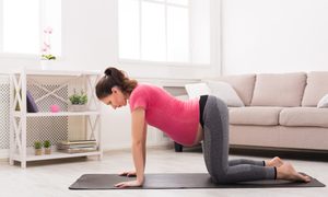 A pregnant woman doing yoga