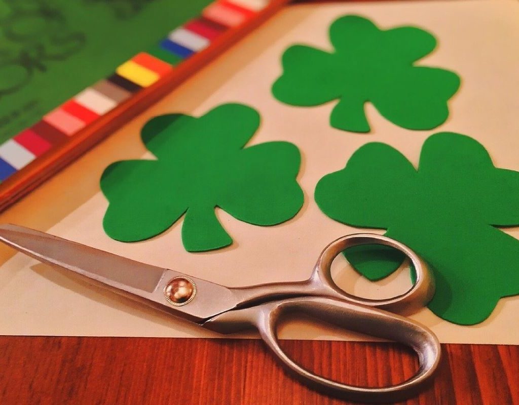 Cut-out shamrocks on a table