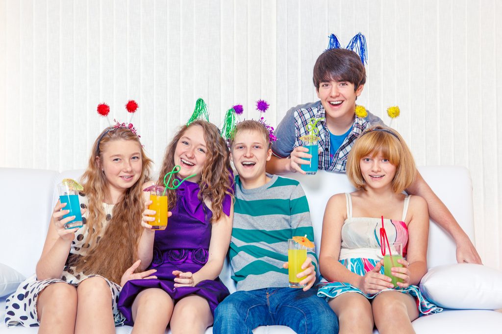 Happy teens at a birthday party