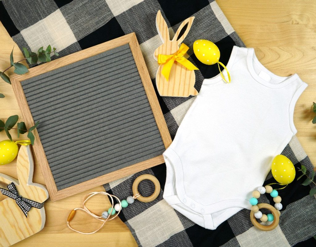 Onesie and props for a baby photo