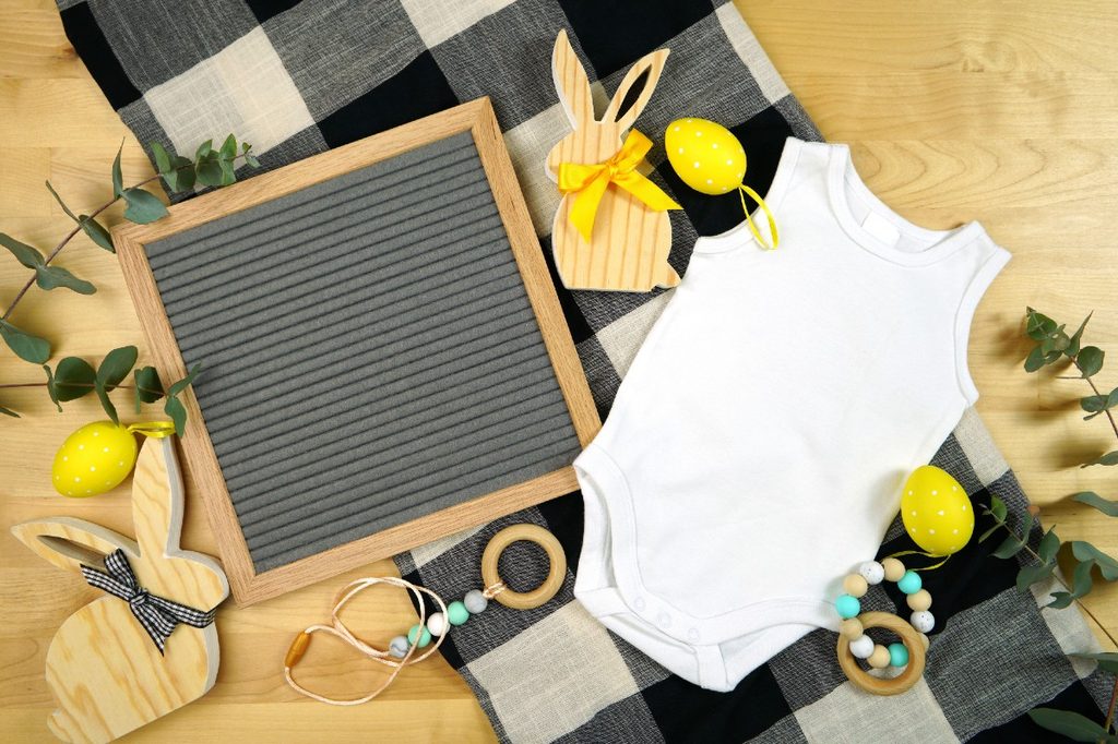 Onesie and props for a baby photo