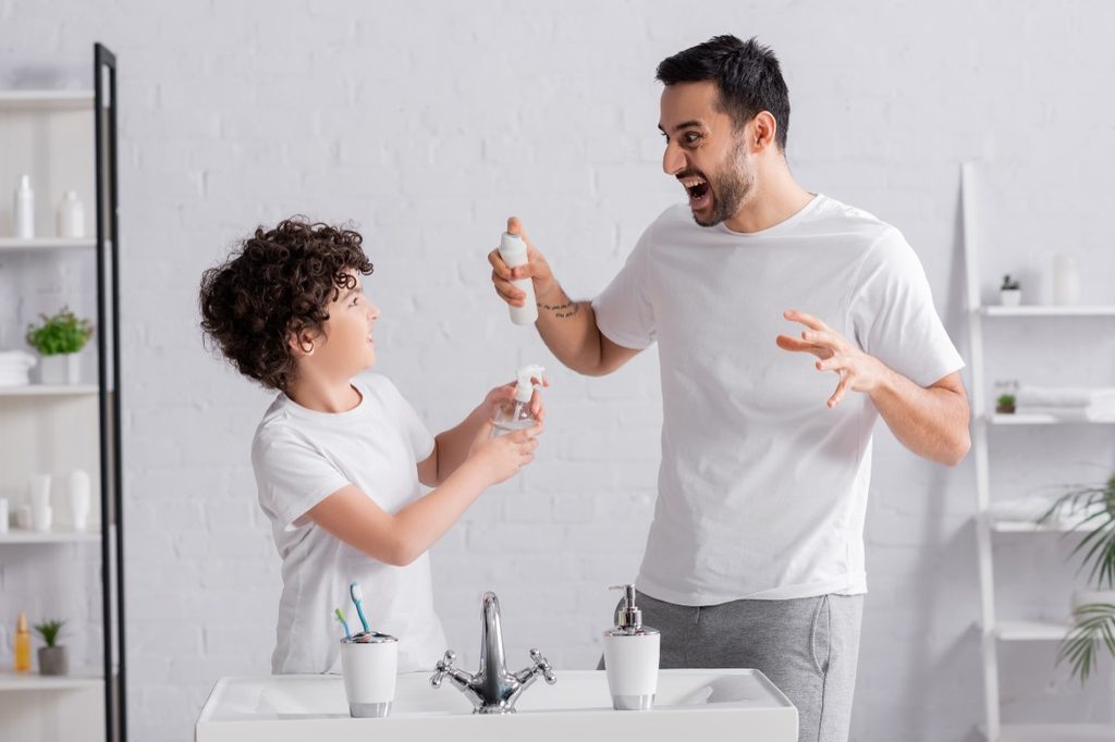 Father and son with deodorant.