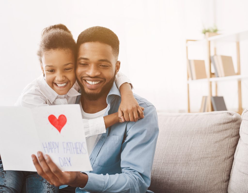 Little girl and her dad celebrating