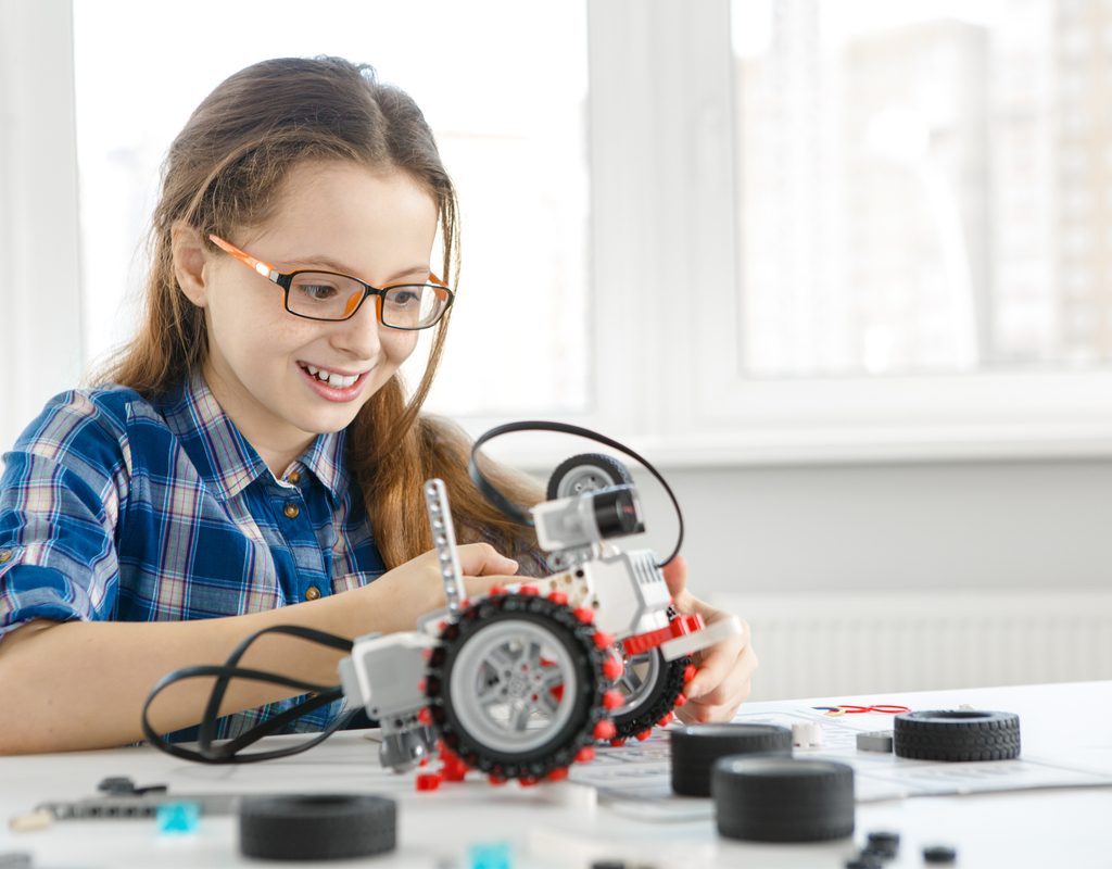 Girl having fun doing a science experiment
