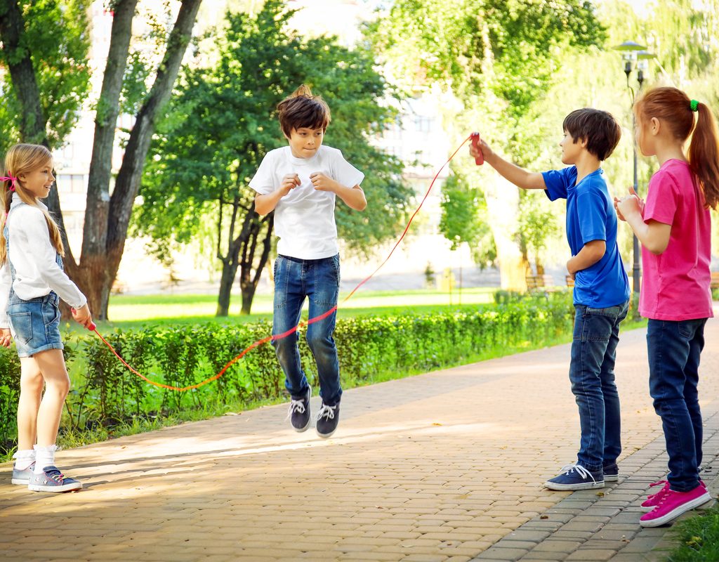 Kids having fun jumping rope