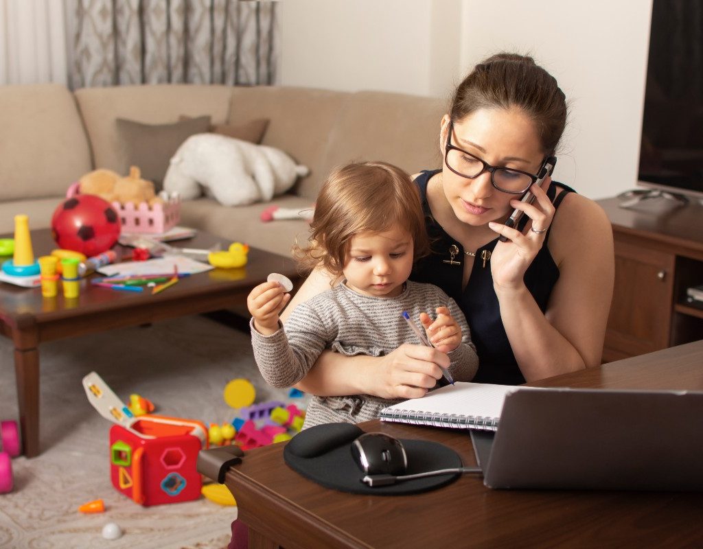 mom working from home with a toddler