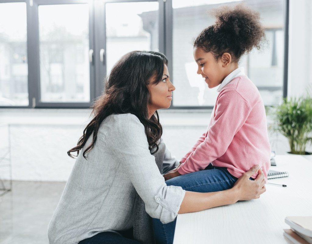 Mother and daughter talking.