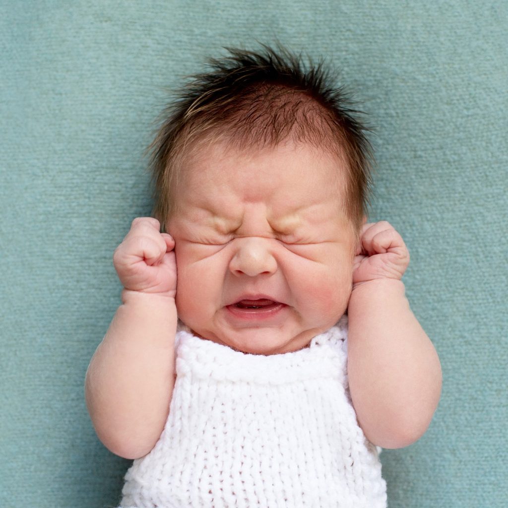 Unhappy newborn crying