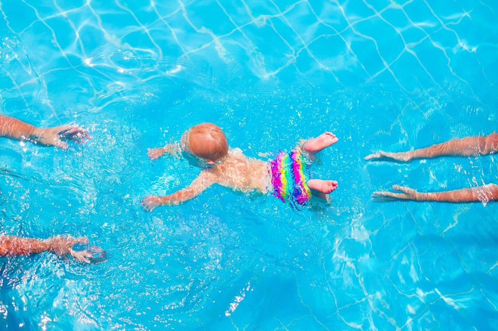Baby swimming in a pool