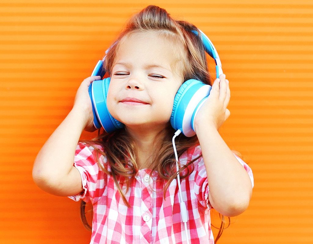 Preschooler wearing headphones