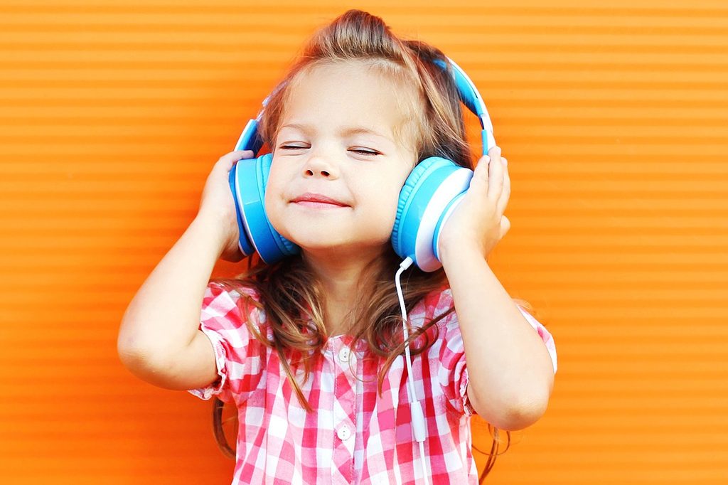 Preschooler wearing headphones