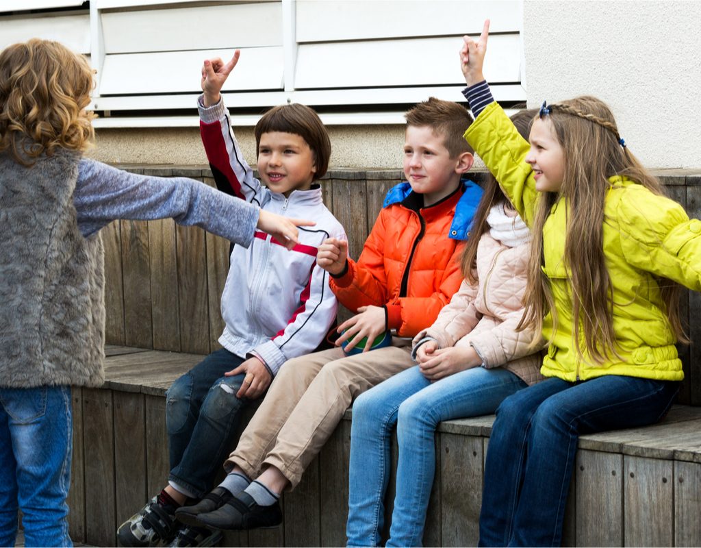 kids having fun playing an improv game outside