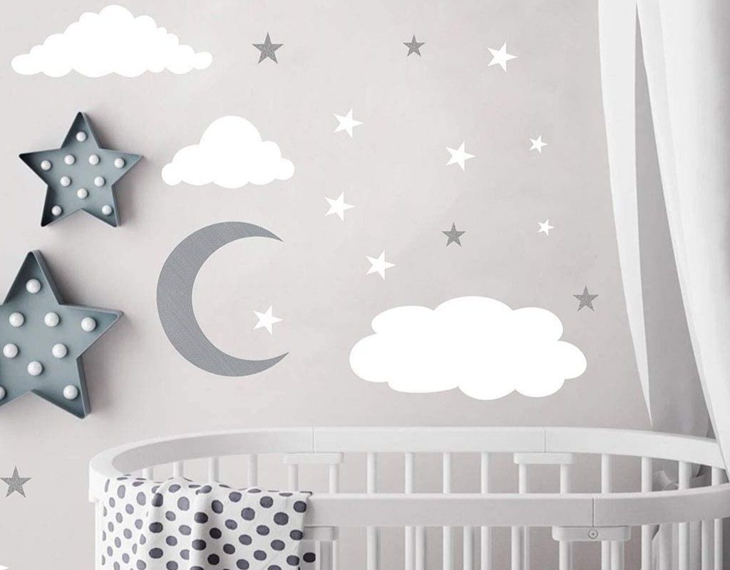 A nursery with moon and stars decorations.
